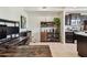 Cozy living space adjacent to modern kitchen at 1003 Fairwaycove Ln # 103, Bradenton, FL 34212