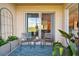 Charming patio with seating area and scenic views, perfect for enjoying outdoor living and relaxation at 1003 Fairwaycove Ln # 103, Bradenton, FL 34212