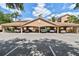 Designated covered parking with multiple spaces and close proximity to residences at 1003 Fairwaycove Ln # 103, Bradenton, FL 34212