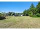 Wide open backyard view of home, ready for recreation and relaxation at 101 N Taylor Rd, Seffner, FL 33584
