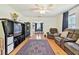 Spacious living room with hardwood floors that provides ample living space at 101 N Taylor Rd, Seffner, FL 33584