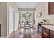 Cozy dining area featuring a round table with seating for four near a bright window at 10911 Rockledge View Dr, Riverview, FL 33579