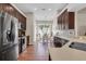 Spacious kitchen featuring stainless steel appliances and an adjacent dining area with natural light at 10911 Rockledge View Dr, Riverview, FL 33579