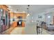 Modern kitchen featuring stainless steel appliances, granite countertops, and a breakfast bar, perfect for casual dining and entertaining at 11535 64Th Ter, Seminole, FL 33772