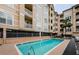A swimming pool at a residential complex at 1216 S Missouri Ave # 108, Clearwater, FL 33756