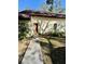 Single story home exterior with a brown front door, shade tree, and a well-manicured lawn at 12315 Touchton Dr # 90, Tampa, FL 33617