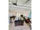 Spacious living room with tiled floors, modern seating arrangement, and natural light from French doors at 12315 Touchton Dr # 90, Tampa, FL 33617
