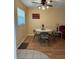 Comfortable dining area features laminate floors and natural lighting at 1301 S Hercules Ave # 19, Clearwater, FL 33764