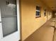 Apartment exterior showcasing the unit door with white trim and the apartment number at 1301 S Hercules Ave # 19, Clearwater, FL 33764