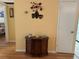 Inviting hallway with decor and a glimpse into other living spaces at 1301 S Hercules Ave # 19, Clearwater, FL 33764