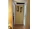 Hallway with artwork on display; doorways leading into other areas at 1301 S Hercules Ave # 19, Clearwater, FL 33764