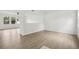 Spacious living room with wood floors and lots of natural light at 13506 Copper Belly Ct, Riverview, FL 33569