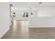 Spacious living room with wood floors and lots of natural light at 13506 Copper Belly Ct, Riverview, FL 33569