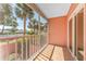 Enjoy Florida's lifestyle on this cozy screened balcony with views of palm trees at 14506 Alejo Ct, Seminole, FL 33776