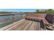Enjoy waterfront living with access to the community dock and bench seating at 14506 Alejo Ct, Seminole, FL 33776