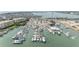 Aerial shot of a full-service marina with boats, yachts and access to the Intracoastal waterway at 14506 Alejo Ct, Seminole, FL 33776