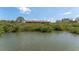 Beautiful water view from the property, showcasing the community's serene waterfront setting at 14506 Alejo Ct, Seminole, FL 33776