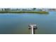 Open water view of bay and dock in a waterfront community with condos at 14506 Alejo Ct, Seminole, FL 33776
