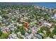 A serene neighborhood is captured from above, located near open water and city amenities at 146 8Th Ne Ave, St Petersburg, FL 33701