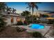 Beautiful backyard featuring a pool, spa, sun loungers, and tropical plants at 146 8Th Ne Ave, St Petersburg, FL 33701