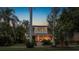 Charming two-story home boasting a welcoming front porch and beautiful landscaping at 146 8Th Ne Ave, St Petersburg, FL 33701