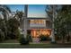 Charming two-story home boasting a welcoming front porch and beautiful landscaping at 146 8Th Ne Ave, St Petersburg, FL 33701