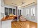 Well-lit living room featuring custom built-in shelving and ample workspace at 146 8Th Ne Ave, St Petersburg, FL 33701