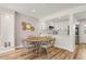 Cozy dining area with a round table and chairs, adjacent to the modern kitchen at 1577 Chateaux De Ville Ct, Clearwater, FL 33764