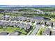 An aerial view of a beautiful community near a lake and forest at 17737 Everlong Dr, Land O Lakes, FL 34638