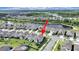 An aerial view of a beautiful community near a lake and forest at 17737 Everlong Dr, Land O Lakes, FL 34638