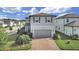Charming two-story home with brick driveway and well-manicured landscaping at 17737 Everlong Dr, Land O Lakes, FL 34638