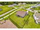 An aerial view highlights the manicured lawn and landscaping around this lovely single-Gathering home at 17804 Brewster Grn, Lutz, FL 33559