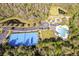 An aerial view of the community highlighting the tennis and basketball courts, pool and playground at 17804 Brewster Grn, Lutz, FL 33559