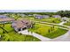 Elevated view showcases the property's location within a neighborhood with well-maintained lawns at 17804 Brewster Grn, Lutz, FL 33559