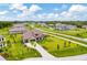 A scenic aerial view showcasing a community with beautiful homes, lush landscaping, and well-maintained streets at 17804 Brewster Grn, Lutz, FL 33559