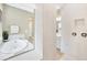 Well-lit bathroom with a soaking tub and a glass enclosed shower with modern fixtures at 17804 Brewster Grn, Lutz, FL 33559
