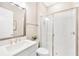 Modern bathroom features sleek glass shower, vanity with sink and modern fixtures at 17804 Brewster Grn, Lutz, FL 33559