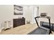 Cozy exercise room with wood-look tile flooring and workout equipment at 17804 Brewster Grn, Lutz, FL 33559