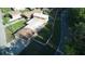 This aerial shot showcases the home's spacious yard and features of the home's layout at 18121 Geraci Rd, Lutz, FL 33548