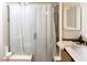 Modern bathroom featuring a vanity, a shower, and wood-look floors at 18121 Geraci Rd, Lutz, FL 33548