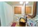 Bathroom featuring a vanity sink, medicine cabinet and shower tub at 18121 Geraci Rd, Lutz, FL 33548