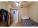 Bedroom with a ceiling fan, closet, and a bed at 18121 Geraci Rd, Lutz, FL 33548