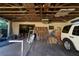 View of garage with a workbench and supplies at 18121 Geraci Rd, Lutz, FL 33548