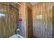 The shower features tiled walls, a showerhead, and a glass shower door at 18121 Geraci Rd, Lutz, FL 33548