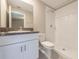 Bathroom featuring a stand-up shower, toilet, and vanity with granite counters at 190 Rain Berry Ave, Ruskin, FL 33570