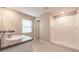 Well-lit bathroom with double sink vanity, granite countertop, and a walk-in shower at 190 Rain Berry Ave, Ruskin, FL 33570