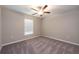 Bedroom featuring neutral paint, carpet flooring, and a ceiling fan at 190 Rain Berry Ave, Ruskin, FL 33570
