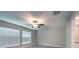 Bedroom featuring a ceiling fan, carpet flooring and great natural light at 190 Rain Berry Ave, Ruskin, FL 33570