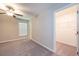 Bedroom featuring neutral paint, a ceiling fan, a window with blinds, and a closet at 190 Rain Berry Ave, Ruskin, FL 33570
