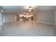 Spacious living room featuring tile flooring, ceiling fan, and an open concept design at 190 Rain Berry Ave, Ruskin, FL 33570